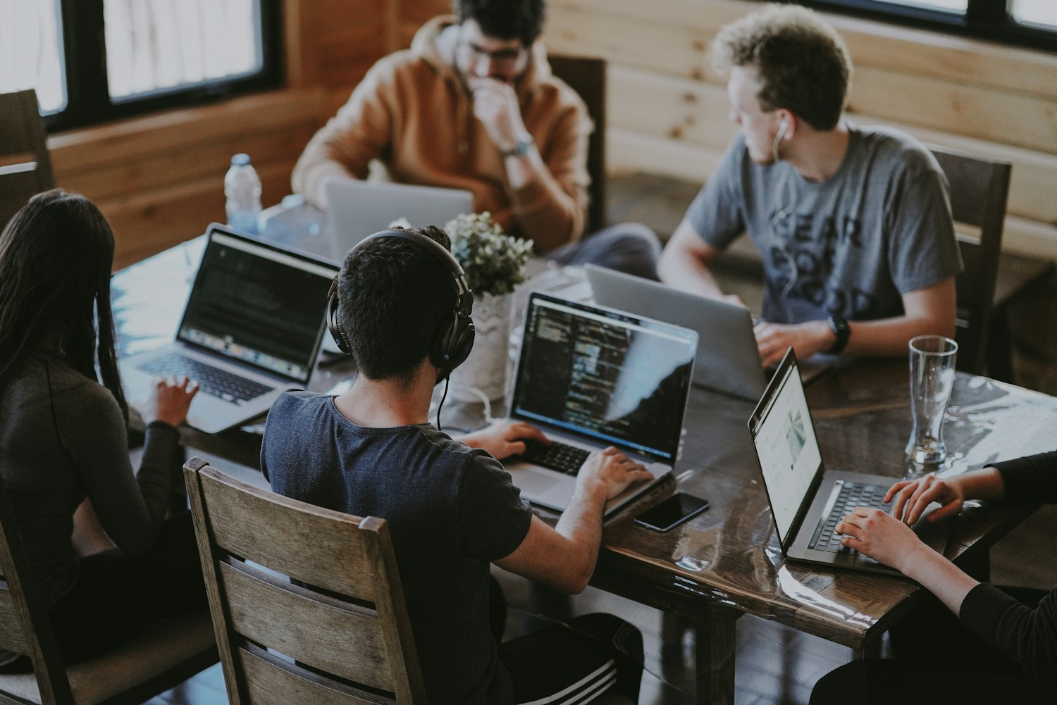 A team collaborating naturally in a modern office