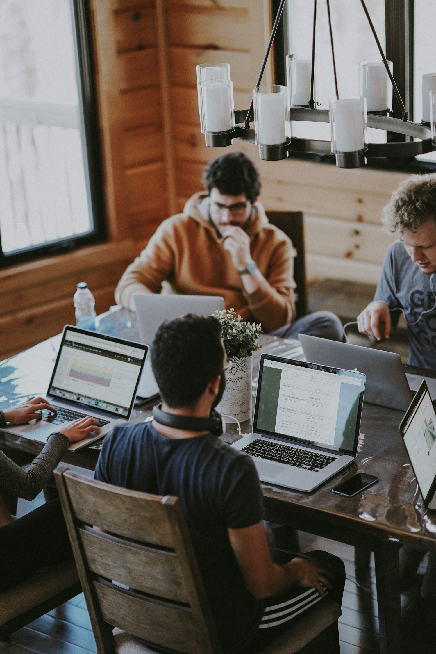 Business leaders working together around a meeting table