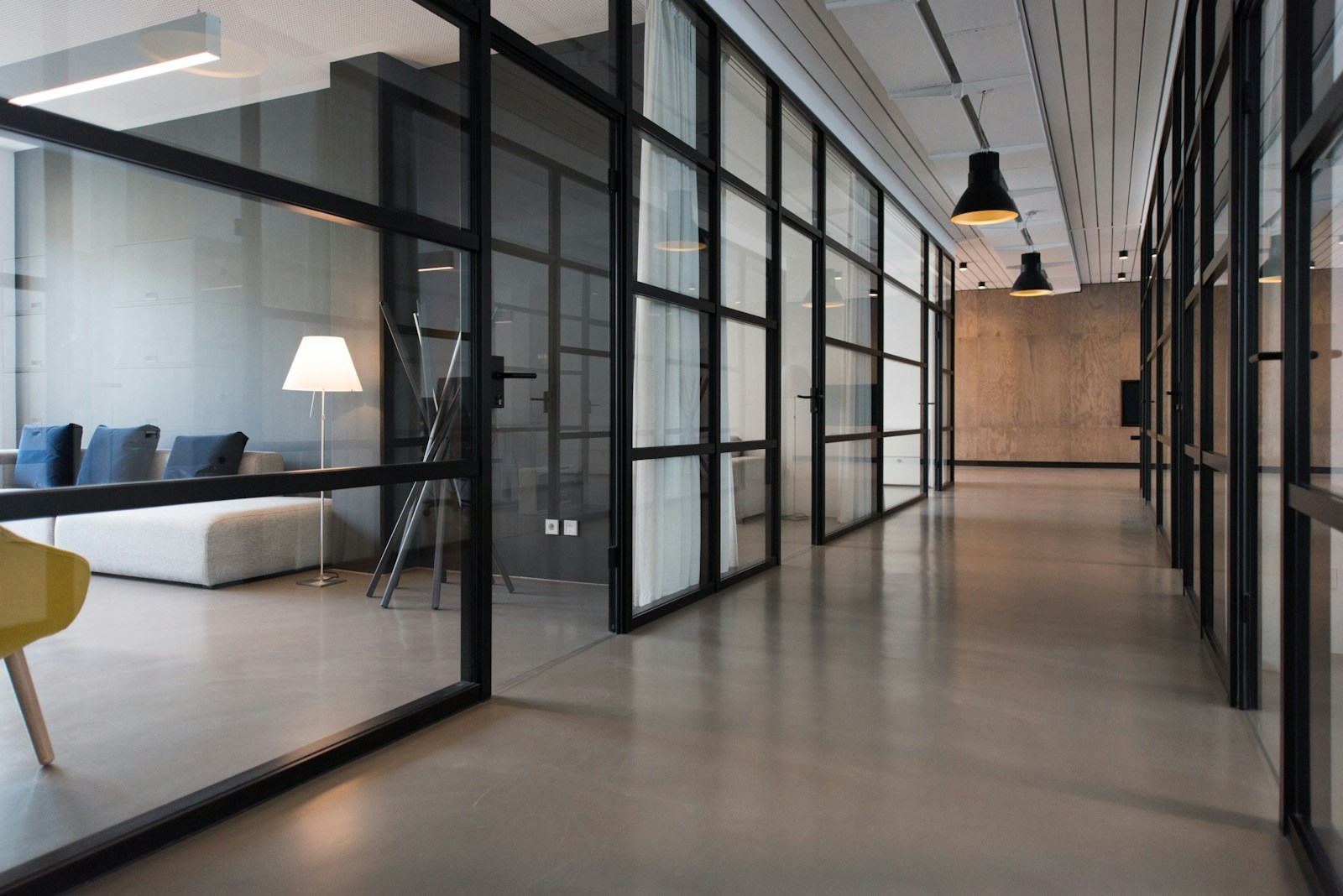 Contemporary premium workspace with natural light and collaborative seating