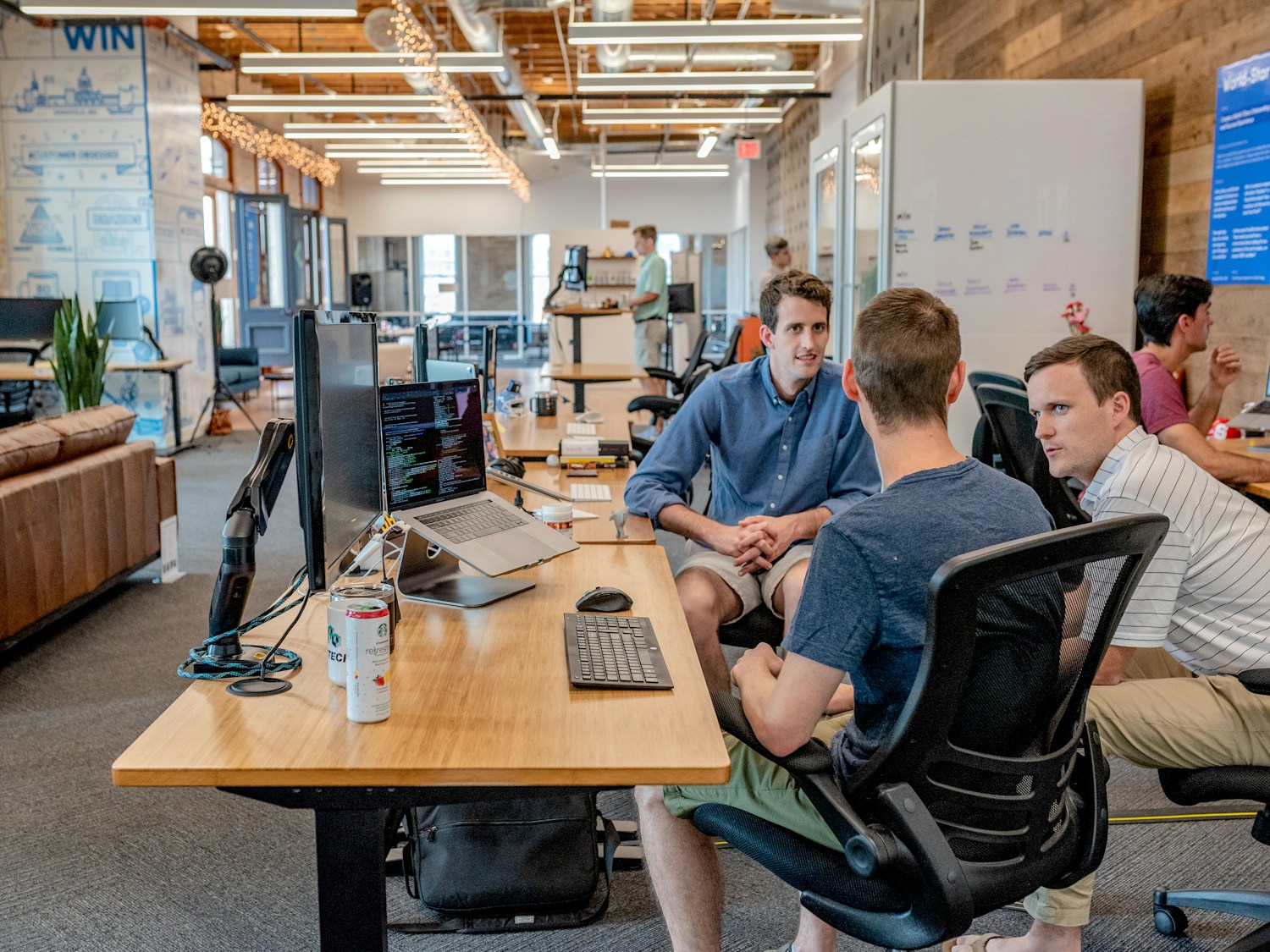 A contemporary workplace team using connected office technology